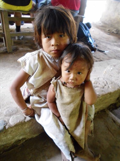 Kogi children we would on the path every day. They speak Chibchan, not Spanish. Except for one word, 