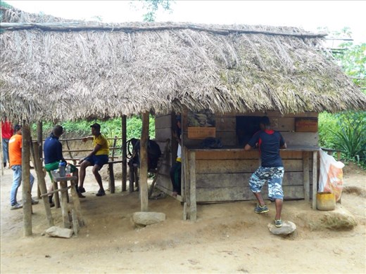 A break-stop at the locals' hut for fresh fruit.