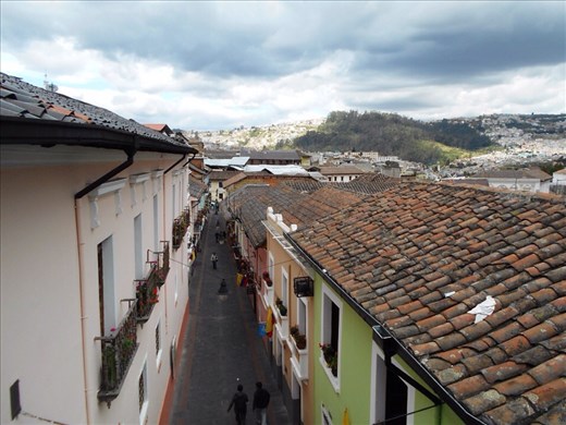 Streets of Quito. Small one way streets, tall buildings, lots of concrete and very patriotic with the flag out everywhere.