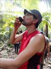 Refreshing jungle beverage, Jorge drinking from Ivory Palm seeds.: by jorjejuanita, Views[357]