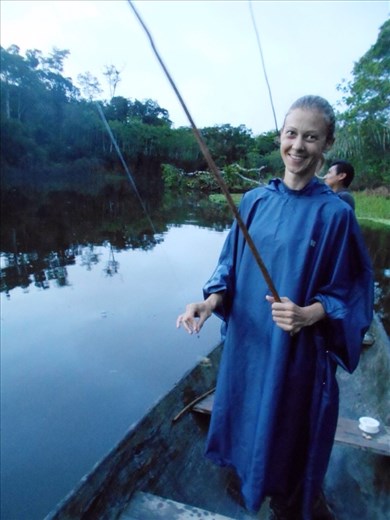 Juanita fishing in the rain. Didn't catch anything, the piranhas ate all the bait too quickly. They love chicken.