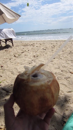 Couldn't resist buying a chilled coconut from the beach-sellers, cut with a machete, lots and lots of coconut water inside. Very refreshing.