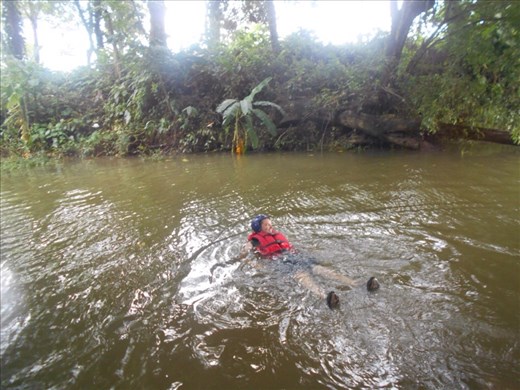 Jorje having a dip off the raft.