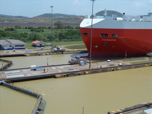 The little trains pulling the ship into the lock, up to the gates.