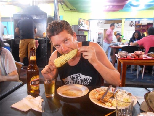 Jorje mowing into some local barbequed corn
