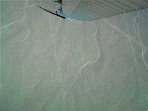 The view straight down as the pilot banked the plane into a 90 degree turn. This was also Juanitas undoing  