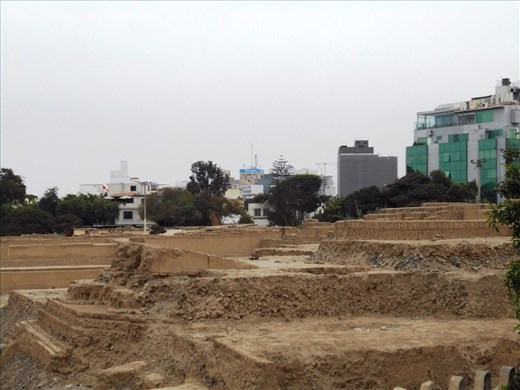 Huaca Ruins. Love the modern buildings in the background. None of the city is skyscrapers as its seismic in Lima. And all the roofs are flat as it never rains in Lima, it's in the desert. The Pacific Ocean on one side is too cold and the mountains on the other side are too high for the rains to get past.