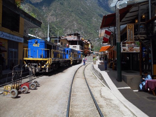The main street of Machu Picchu town has the train line running through it