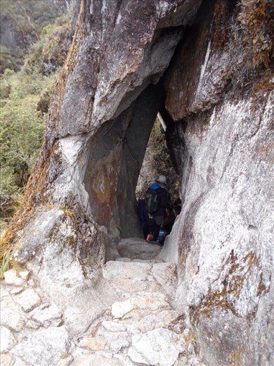 The trail cuts through several natural caves