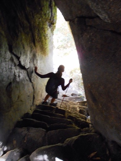 Juanita heading out of an Inkan cave