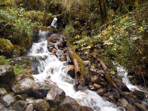 Waterfall crossing the trail.