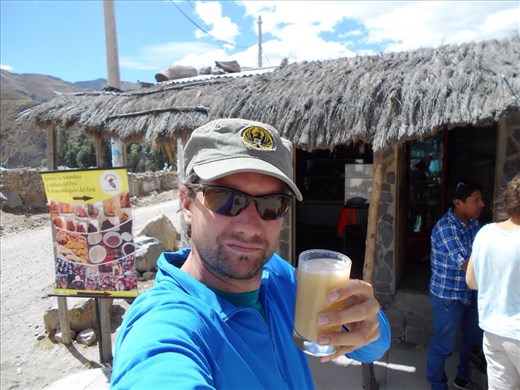 Jorje enjoying a chicha beer, made from corn. Can make beer out of anything hey.