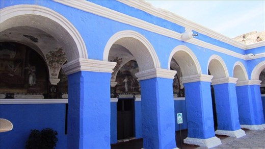 Walkways of Orange Tree cloister in Santa Catalina Monastrey. All fully decorated ceilings with beautiful paintings.