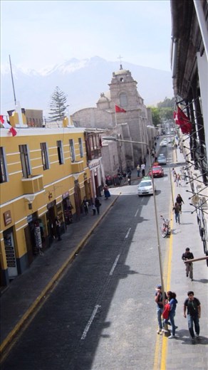 Streetscape from the balcony. Clear blue sky and cool mountain air.