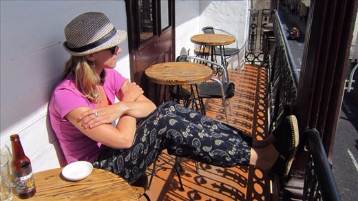 Check out the tan ! Taking in the view of the volcanoes and soaking up the sun on the balcony of a craft beer bar and organic chocolate cafe in-one.