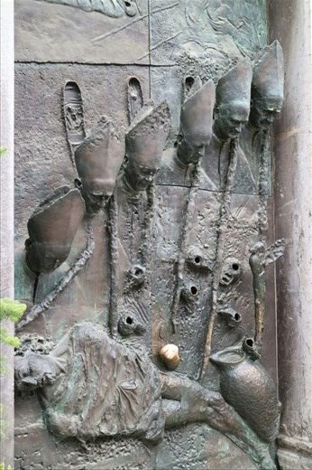 Creepy church door in Ljubljana