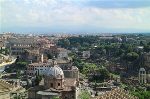 View of the Colosseum and the Roman Forum from the top of the Vittorio Emanuelle monument