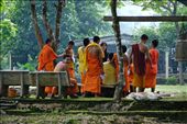 A young monk turns to pose while his fellow students get ready for their English class. : by joshbfilm, Views[290]