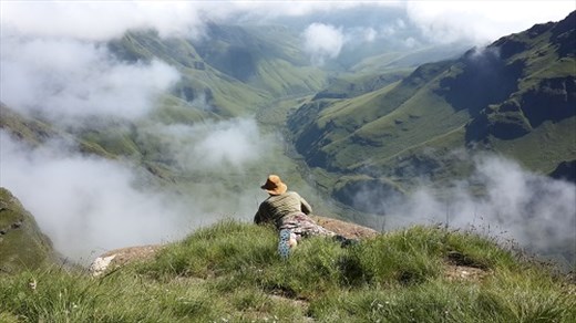 took a quick snap of my brother on our way up grey's pass, Drakensberg. clouds