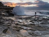 I wanted to capture the power of the sea. The giant wave crashes against the cliff. While this photographer picks up his tripod, observing with fear.: by josm05, Views[257]