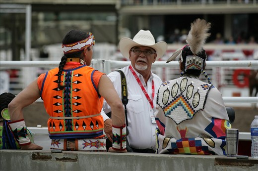 Awkward tension between cowboy and native americans at the rodeo