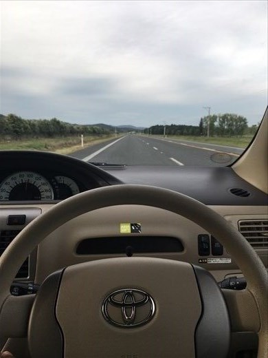 Driving on the left side of the road on the right side of the car!