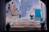 Dressed in his traditional Moroccan dress, a djellaba, this man walks through the maze of predominately blue and white alleyways that make up the Mountain town of Chefchaouen, a popular tourist destination in Morocco.  The locals go about their business as though the thousands of tourists do not exist.
: by joymelchiori, Views[1993]