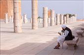 There was a stillness surrounding this Moroccan man as he sat quietly reading from his Qur’an. Beside him rose the unfinished sandstone columns and Hassan Tower minaret, which was intended to be part of the World’s largest mosque in the Moroccan Capital, Rabat.  Throughout Morocco there was a strong presence of religious faith.: by joymelchiori, Views[927]