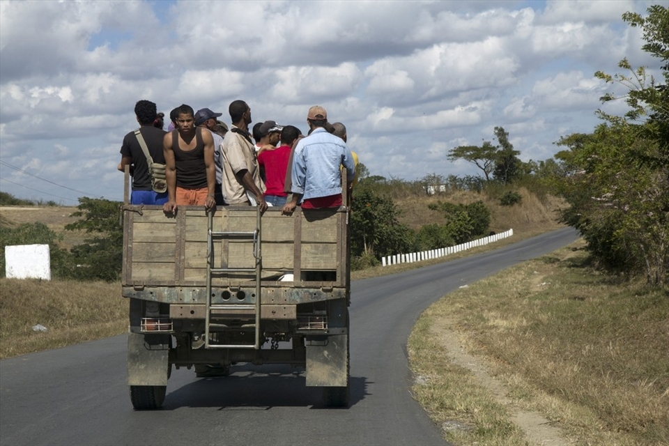 Here we can see locals travelling on a crowded camion particular. They may have waited hours for this ride. The truth is Cuba’s transportation was dramatically changed with the dissolution of the Soviet Union. The so called ‘Special Period’ that followed was defined by severe shortages in energy resources in the form of gasoline, diesel and other petroleum products.  One of Cuba’s innovations during the ‘Special Period’ was to sanction hitchhiking; as a result certain vehicles were obliged to carry passengers. 