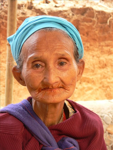 Weary. As an ethnic minority in Shan State, she had seen years of hiding and tragedy, losing not only her people, but her known world as well.