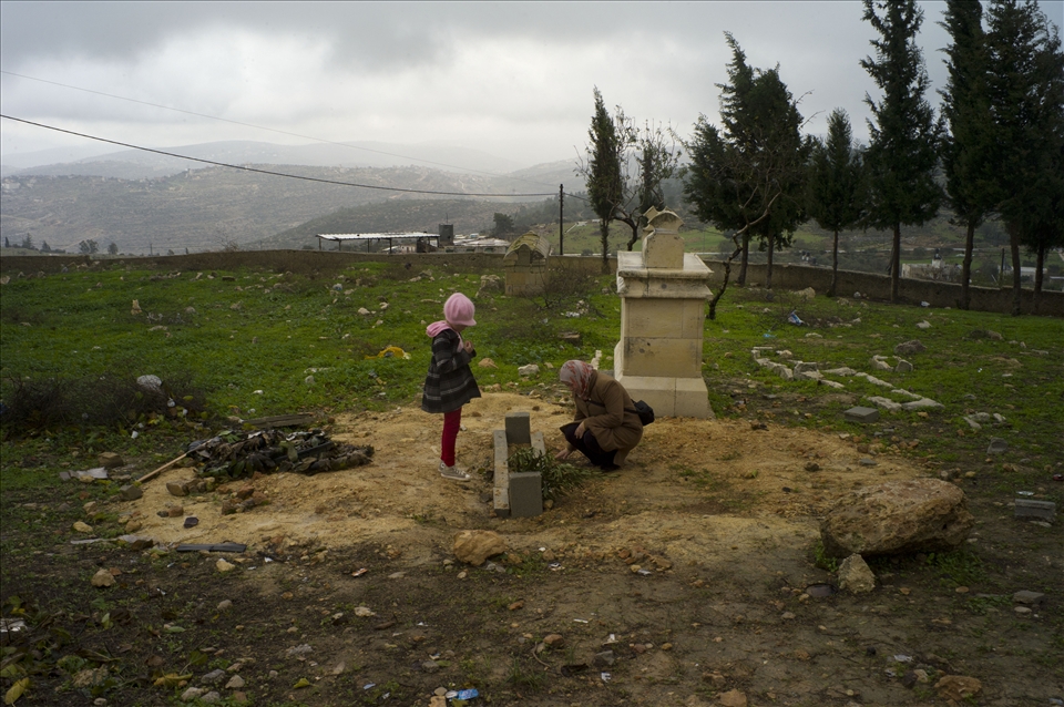 Women mourn the loss of a relative in the West Bank