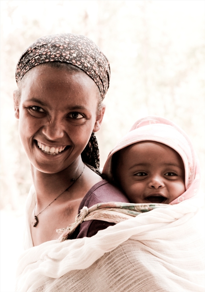 Young mother go to the lesson with her baby.