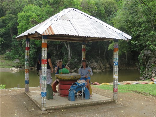 Picnic hut near Rio Dulce - tyres = table. Drink cans = roof supports
