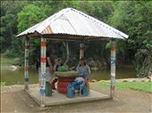 Picnic hut near Rio Dulce - tyres = table. Drink cans = roof supports: by jugap, Views[369]