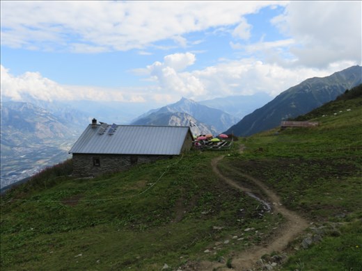 Looking back at a coffee stop on top as we move on