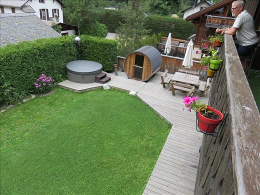 Spa and sauna(used both) in garden - view from verandah ouside coomon area