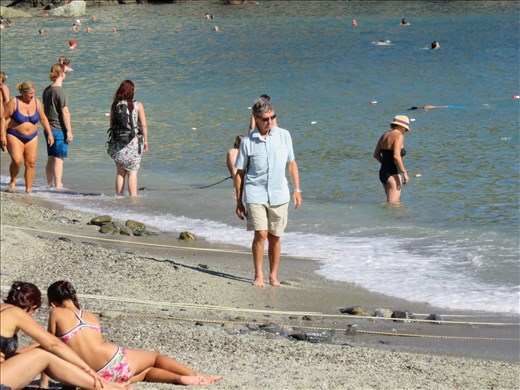 Monterosso - Gary (lt blue shirt) paddling on 