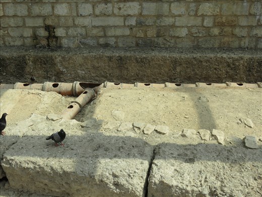 Athens - roman terracotta water pipes - in city square