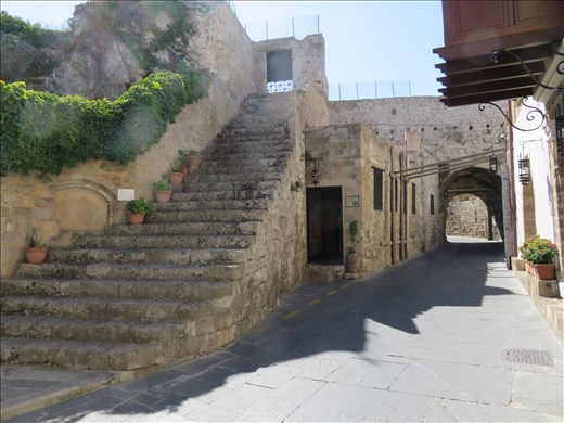 Rhodes - old town -streetscape - door on rt of staircase is to old church