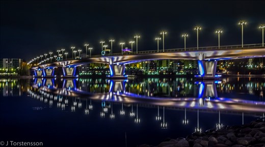 Closer look to the bridge bading in light. Fall.