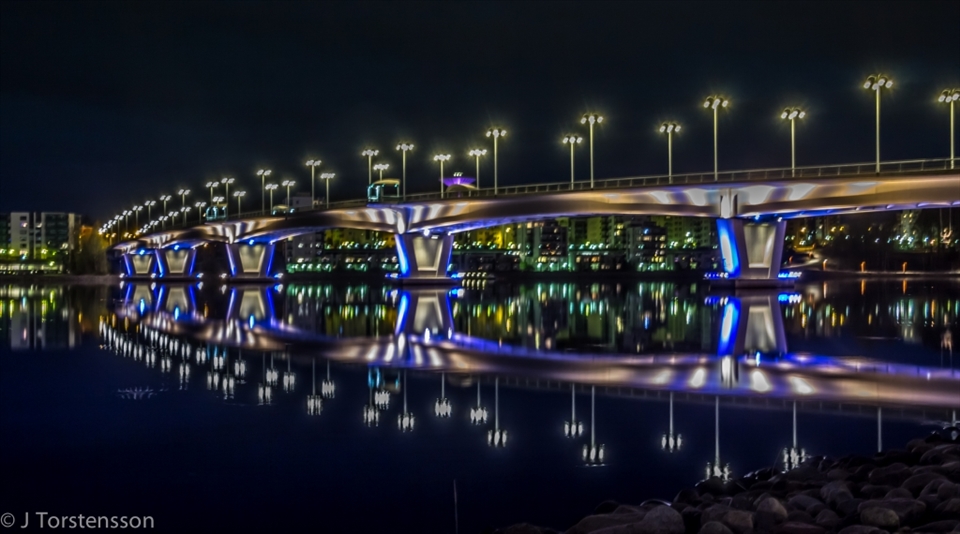 Closer look to the bridge bading in light. Fall.
