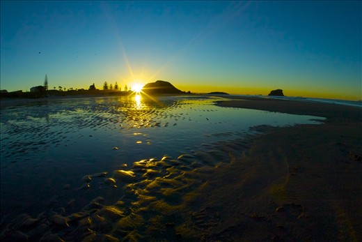 Mount Maunganui, still recovering two years later after a major oil spill.