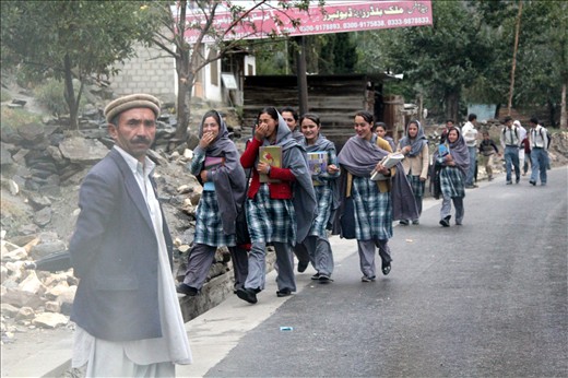 Happy girls coming back from school in Karimabad. 
An access to education for girls is strongly limited by Taliban. How brave can be Pakistani girls  and how big price they have to pay for it shows Malala Yousafzai's case. As an 11-years old girl she started to fight for the right to education for Pakistani girls. Three years later she was shot in her head by Taliban – it was their sentence. Luckily she survived. This case made all Pakistani people stronger in their fight against female illiteracy.
How much would you sacrifice to have the right to go to school?
