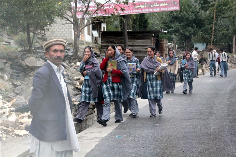 Happy girls coming back from school in Karimabad. 
An access to education for girls is strongly limited by Taliban. How brave can be Pakistani girls  and how big price they have to pay for it shows Malala Yousafzai's case. As an 11-years old girl she started to fight for the right to education for Pakistani girls. Three years later she was shot in her head by Taliban – it was their sentence. Luckily she survived. This case made all Pakistani people stronger in their fight against female illiteracy.
How much would you sacrifice to have the right to go to school?
