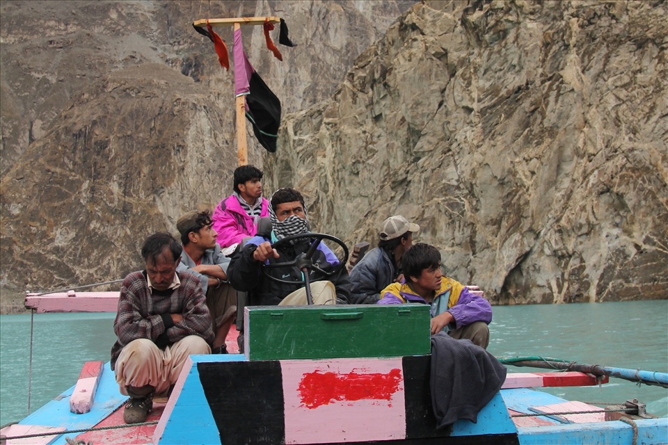 Crossing the Attabad Lake to get home. 
In January 2010,  a huge landslide in Attabad village (the Gojal Valley, north Pakistan) created a natural dam for the Hunza River what resulted in forming an extensive lake. Present, the landscape is breathtaking – turquoise surface enclosed within steep, cut through by narrow waterfall hillsides with appearing here and there flooded green oasis. However this beautiful phenomena is linked to a human tragedy. Those who wants to reach upper part of rescued villages have to travel there by boats. You won’t find the delight by the beauty on their faces. They still remember that their former houses are under this water. Pakistani government did nothing to help them.
Who cares for the people from the lost paradise?
