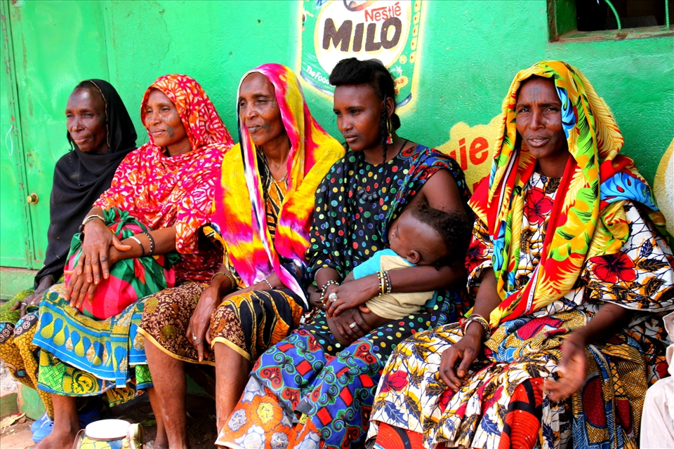 After all day of driving we stopped for food supplies at Labe, Guinea. To our delight we came across a Fulani man and his five wives. The colors and facial tattoos are unique only to the Fulani tribe.