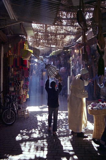 We were exploring the souk in Marrakech. There are so many streets & alleys - all of them full of people, shops & stalls.  There's so much activity & so many sights, sounds & smells that your attention is captured by something new almost every second. And then I saw a boy, walking through the souk on his own, carrying a lantern. Although he was oblivious to it, as he walked through the beams of light that were streaming through the roof, it transformed the everyday into something almost divine.