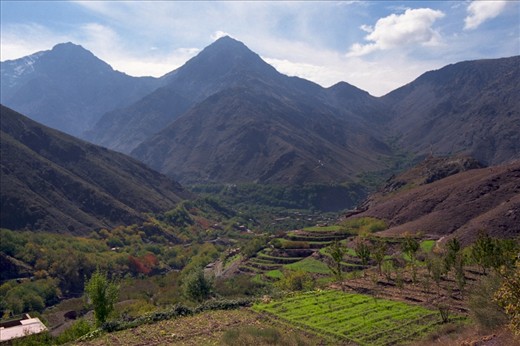 Often when people think of Morocco, they picture the desert and the markets.  What they may not realise is that it is a very diverse country with many different climates and landscapes.  High up in the Atlas Mountains, the local people work the fields that have been cut into the sides of the hills.  The cooler climate is imminently suitable for the crops, creating a patchwork of green across the hillsides, stretching out towards the mountain peaks.