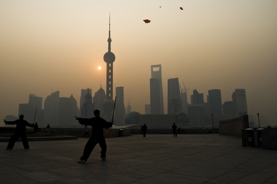 Sunrise at the Bund is a popular time for Shanghai people to relax or socialize 