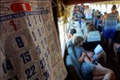 Tourists relax on the slow boat from Huay Xai to Luang Prabang during the low season in July, when heat and rain make travel more exhausting. To the locals, who refit their houseboats with car seats to ferry passengers, it's just another day on the river. The calendar is stuck on January.: by justintreadwell, Views[1411]